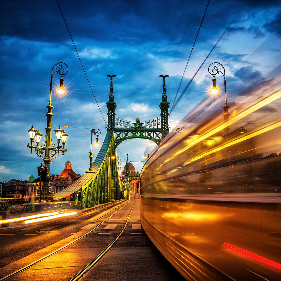 Moving Trams on Liberty Bridge, Budapest Photograph by Gehringj