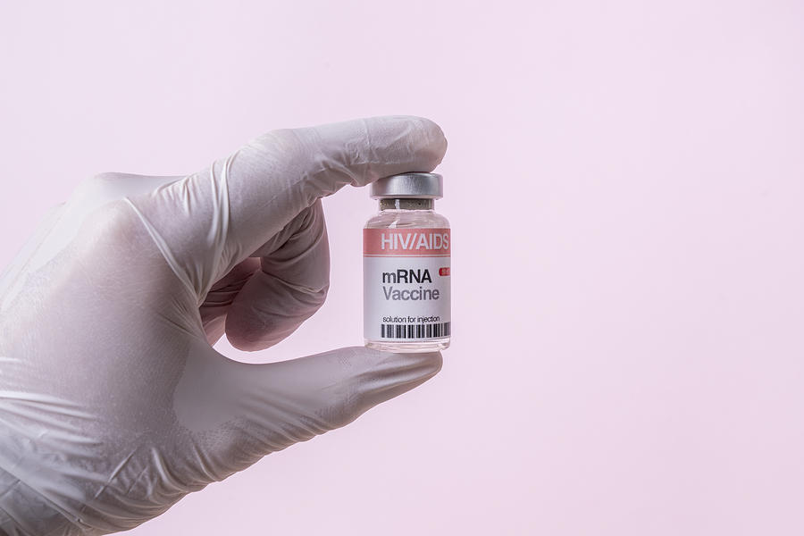 mRNA Vaccine Vial For HIV/AIDS On Pink Background Photograph by Javier Zayas Photography