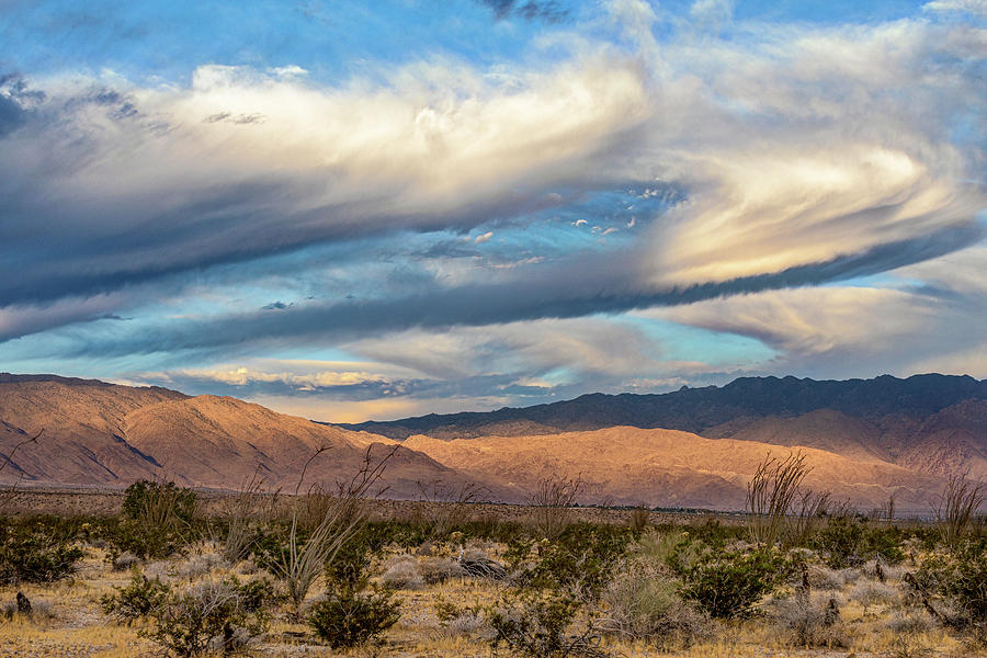Morning Clouds over the Desert Photograph by Peter Tellone