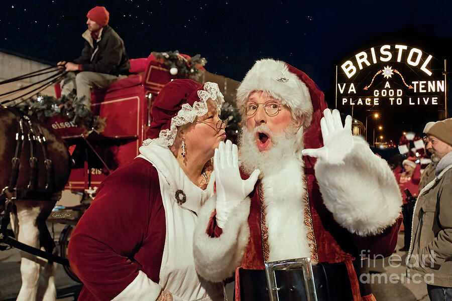 Mrs. Claus sneaking a Kiss from Santa Photograph by Shelia Hunt - Fine ...