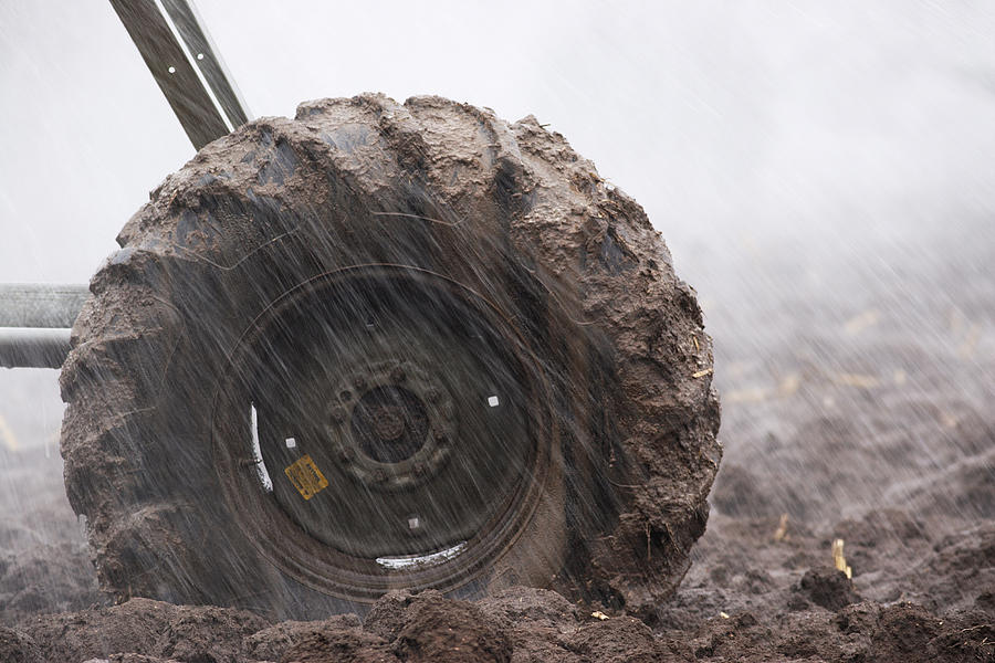 Muddy Tire Agriculture Irrigation Sprinkler Photograph by ChuckSchugPhotography
