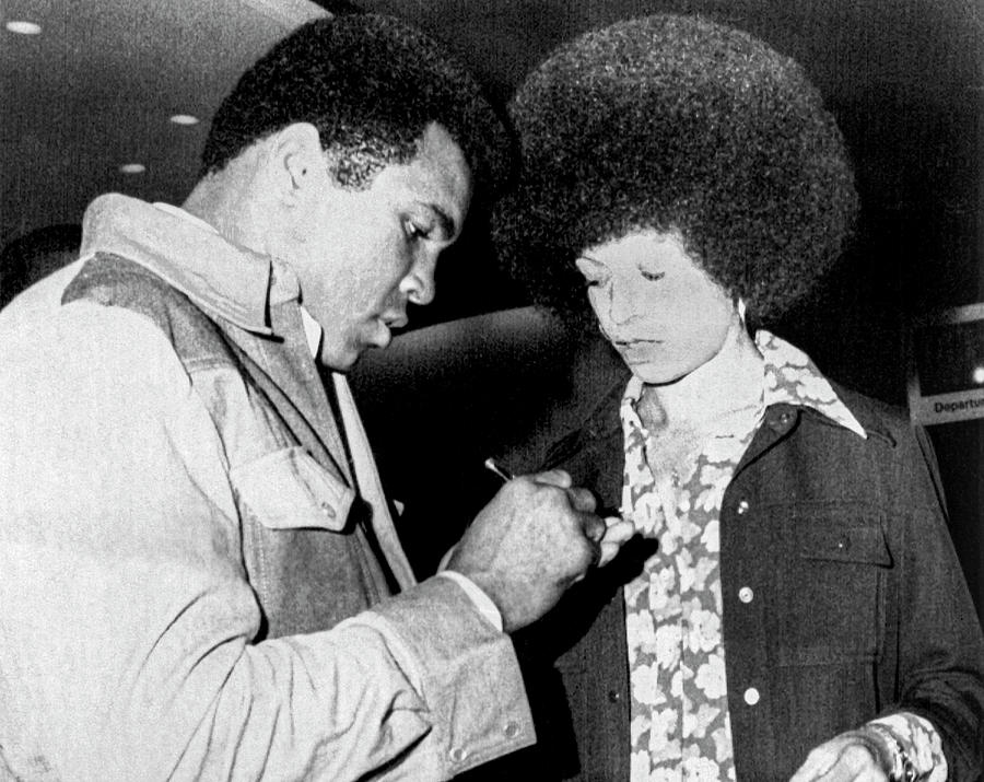 Muhammad Ali and Angela Davis Photograph by Underwood Archives - Fine ...