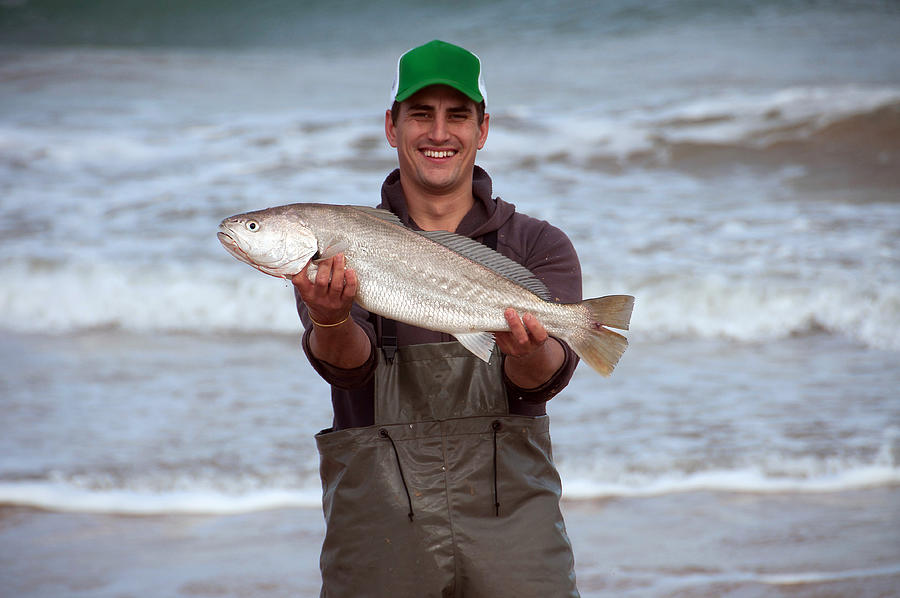 Mulloway fisherman Photograph by Ryan Newton