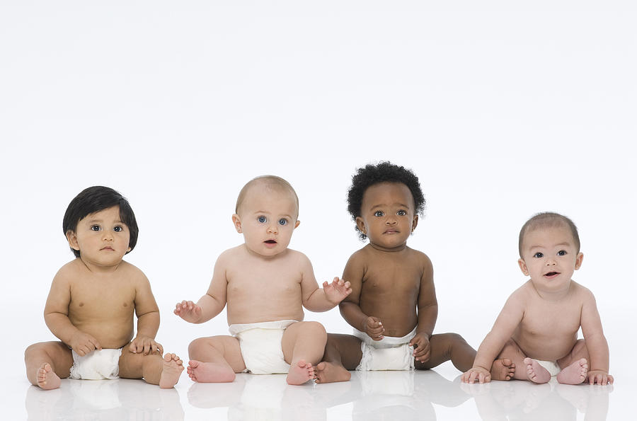 Multi Ethnic Babies Sitting on White. Photograph by Nancy Brown