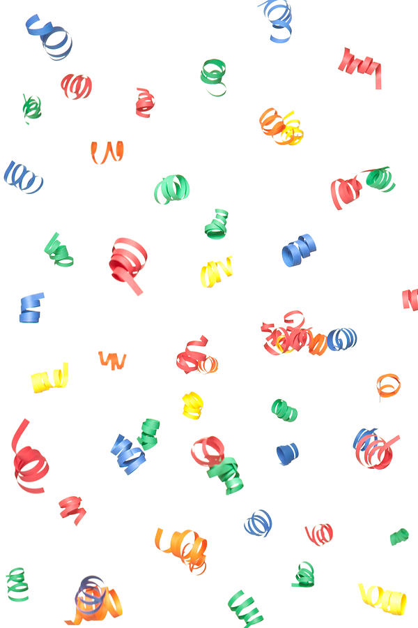 Multicolor Paper Confetti Spirals Falling, Isolated on White Photograph by BanksPhotos