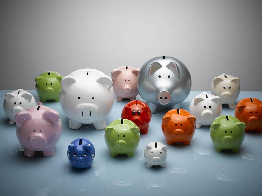 Multicolor piggy banks still life Photograph by Andy Roberts