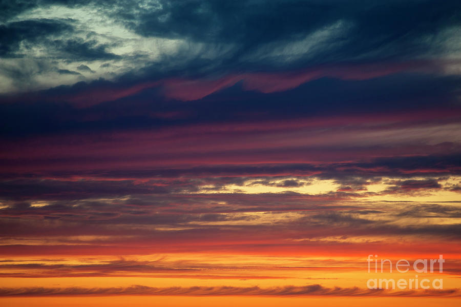 Multicolored Stratocumulus Clouds At Sunset Photograph