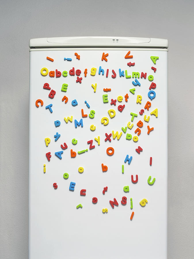 Multicoloured Magnets on a Fridge Door Photograph by Jonathan Kitchen