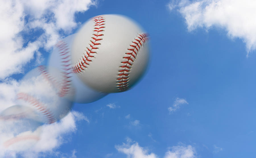 Multiple Exposure of a Baseball Flying Through the Sky Photograph by Ryasick