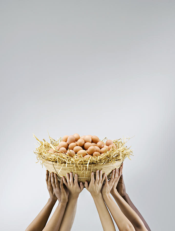 Multiple hands holding a big pile of eggs Photograph by Joos Mind