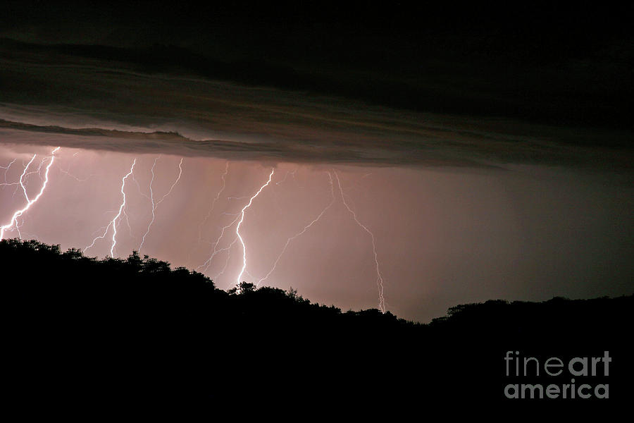 Multiple Lighting Strikes Woods clouds composite Photograph by Pete Klinger