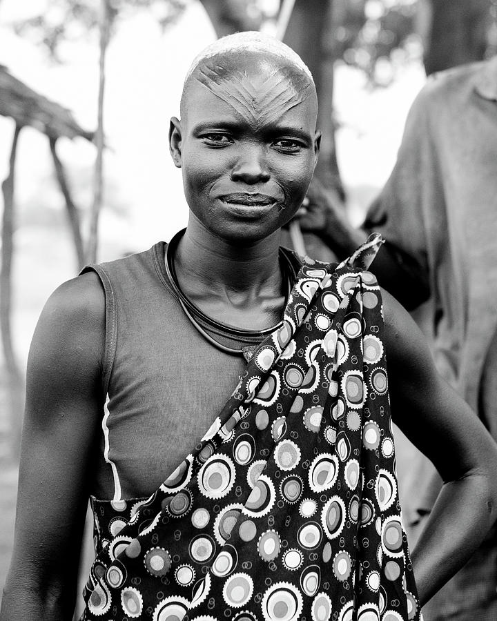 Mundari woman in South Sudan Photograph by John Wollwerth - Fine Art ...