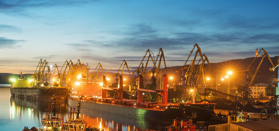 Murmansk sea trading port at evening. Photograph by Pro-syanov
