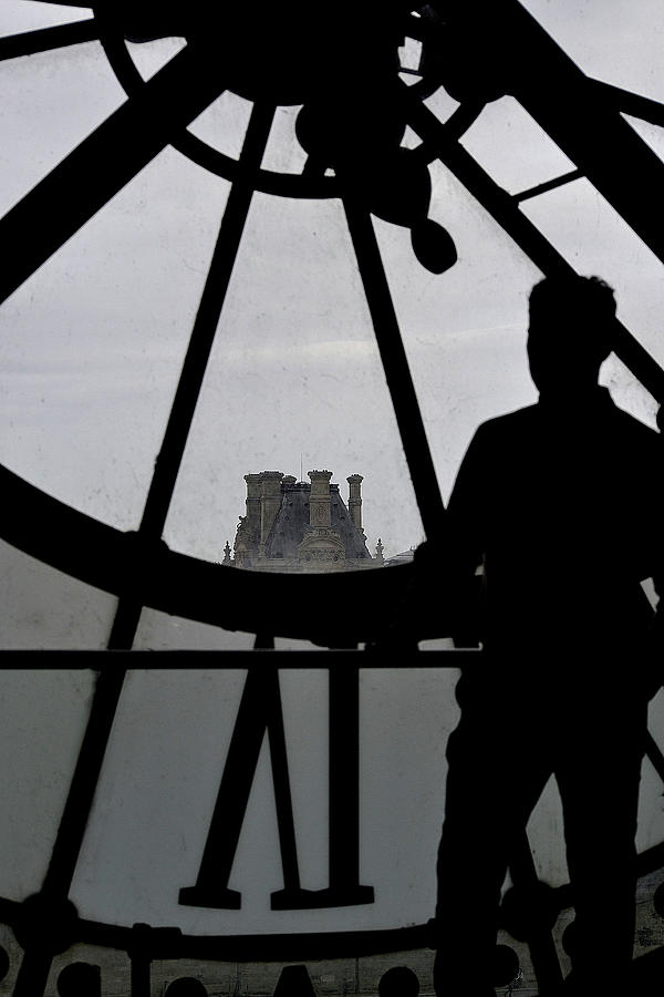 Musee dOrsay Big Clock and Man Photograph by Nadalyn Larsen
