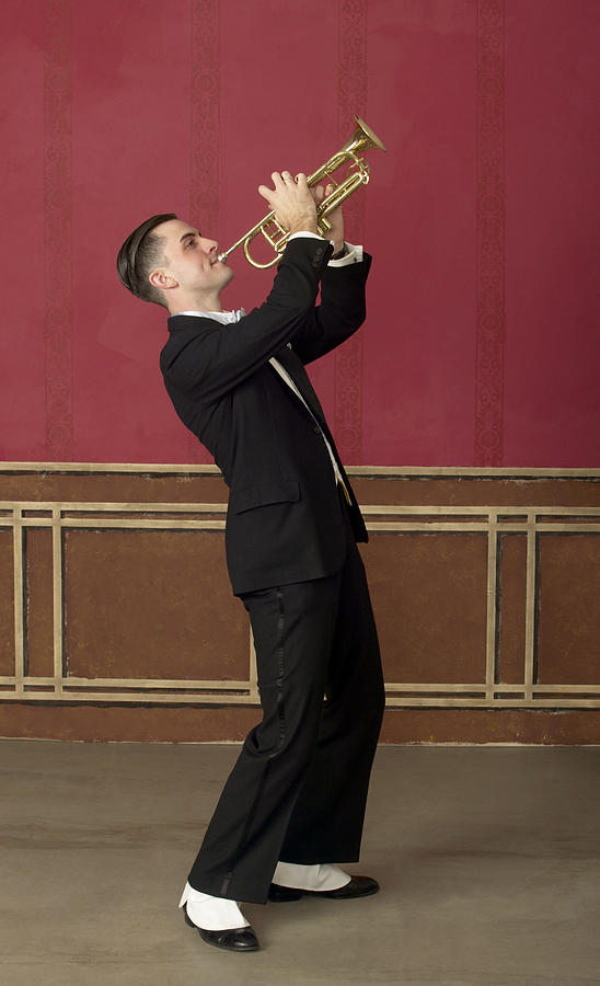 Musician in a 1940s Style Suit and Spats Plays the Trumpet Photograph by Gregory Costanzo