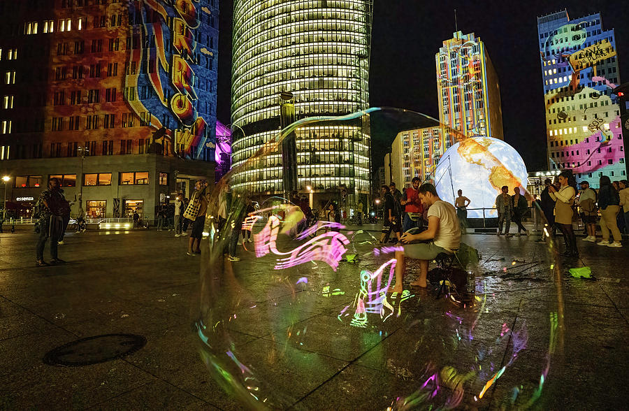 Musician in a bubble in Berlin Photograph by Michael Hodgson