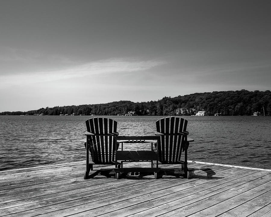Muskoka Chairs and Lake in Ontario, Canada Photograph by Pak Hong