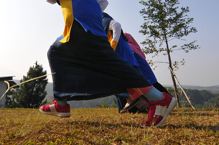 Muslim girls Running Photograph by Fajrul Islam