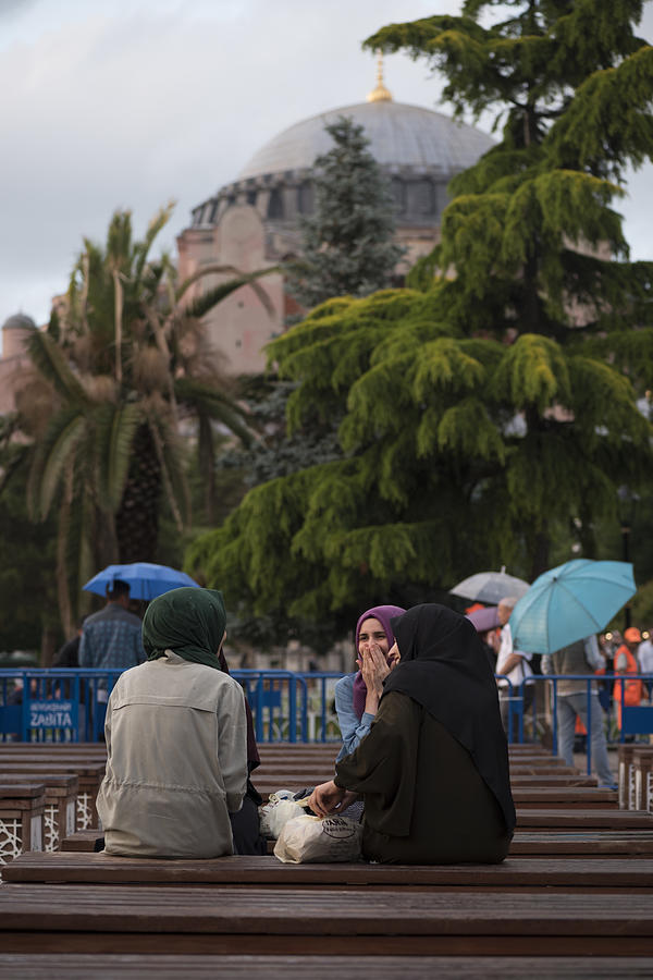 Muslim women in Istanbul waiting for iftar during Ramadan Photograph by Joel Carillet