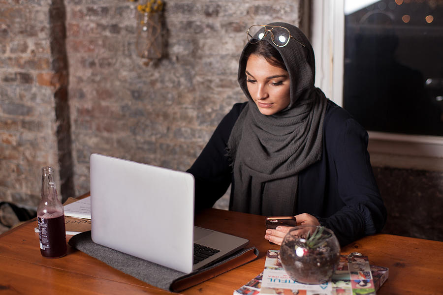 #MuslimGirl working on the computer Photograph by Muslim Girl
