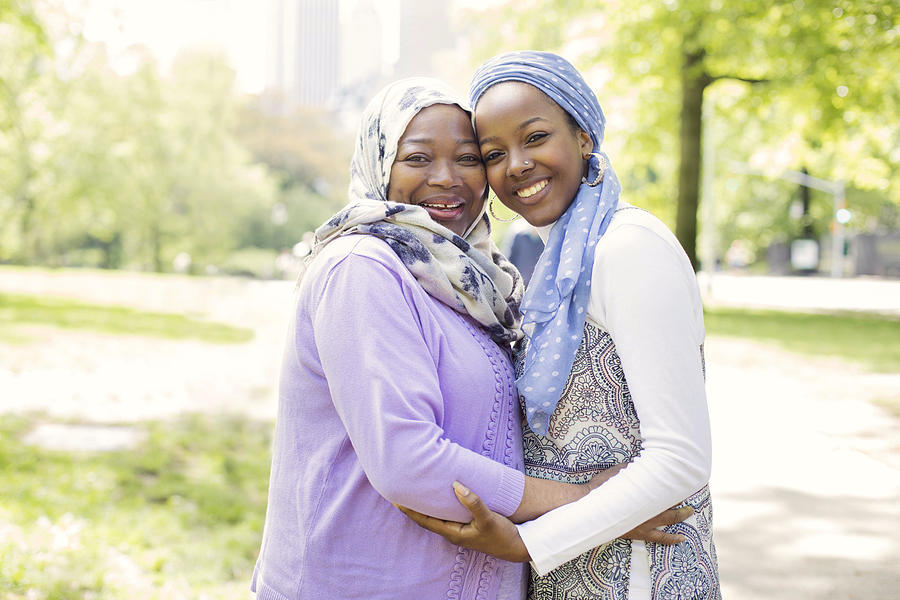 #MuslimGirls; Mom and Daughter Sharing An Embrace Photograph by Muslim Girl