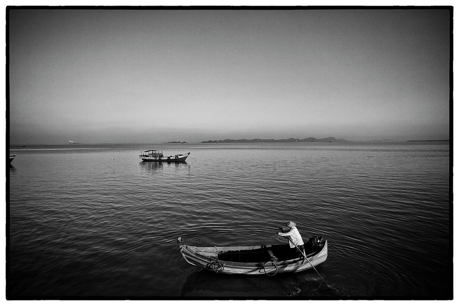 Myanmar boatman Photograph by David Longstreath