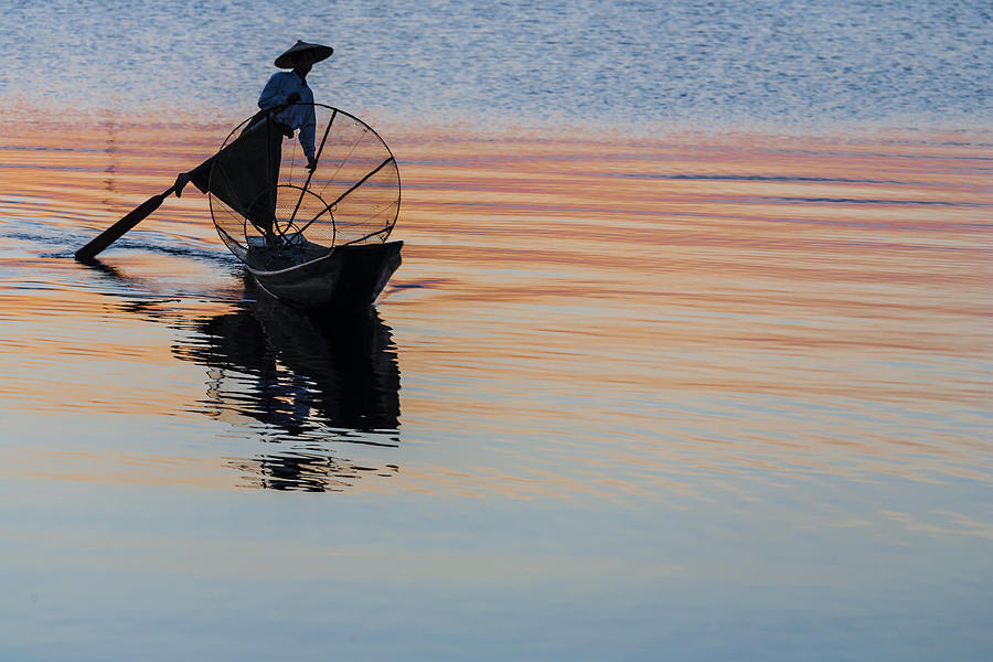 Myanmar: Traditional Fisherman on Inle Lake at Sunset Photograph by Alantobey