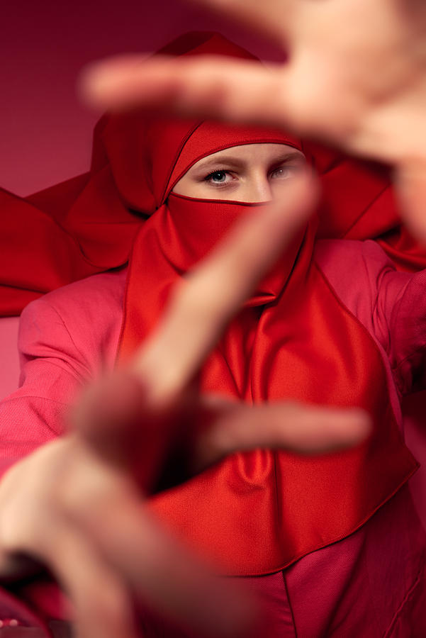 Mysterious dance of woman in niqab Photograph by CliqueImages
