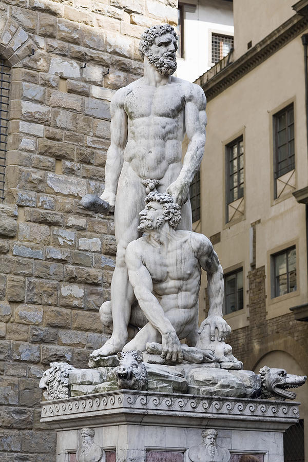 Naked statues in front of a brick wall, Hercules and Caco, Piazza della Signoria, Florence, Italy Photograph by Glowimages
