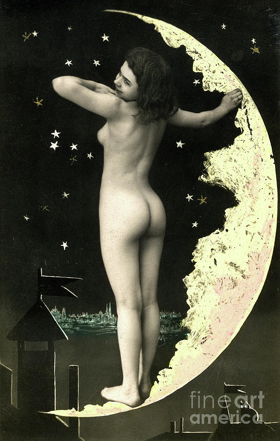 Naked woman standing inside a crescent moon Photograph by French School