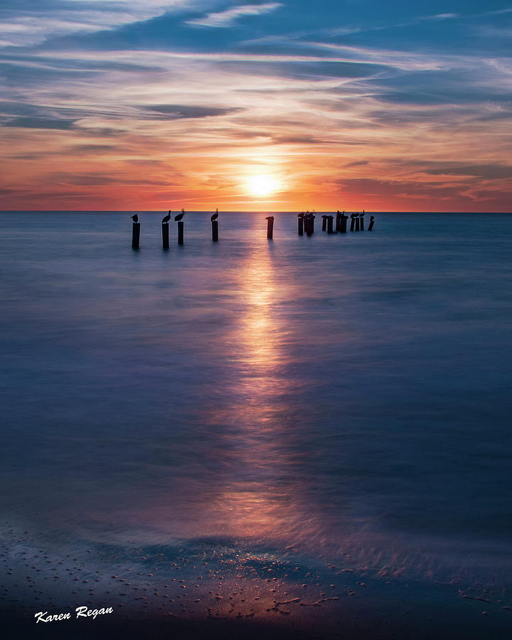 Sunset Photograph - Naples Pilings by Karen Regan