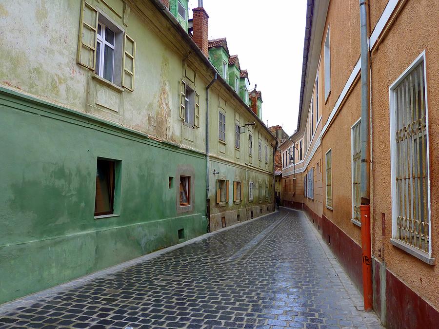 Narrow street in Brasov Photograph by Frans Sellies