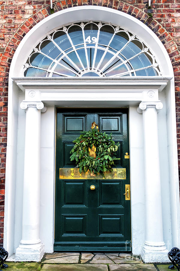 National University of Ireland Christmas Door in Dublin Photograph by John Rizzuto