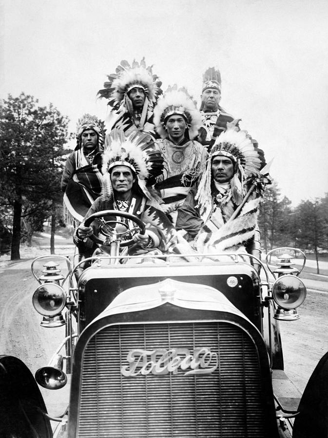 Native Americans In Traditional Dress Driving Car - 1905 Photograph by War Is Hell Store