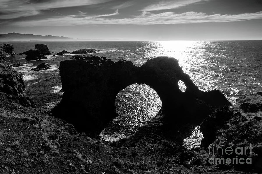 Natural arch rock in Snaefellsnes peninsula, Iceland Photograph by Delphimages Photo Creations