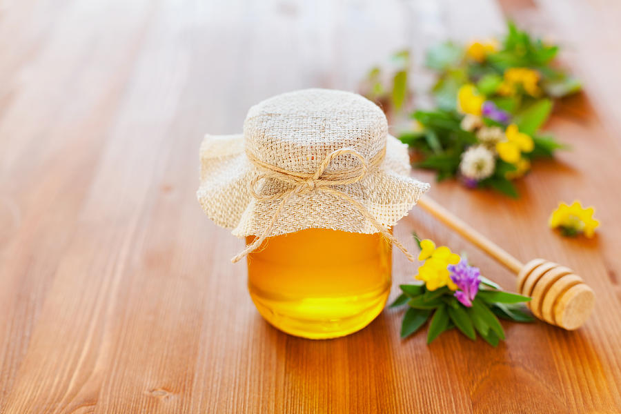 Natural honey with flowers Photograph by Julia_Sudnitskaya