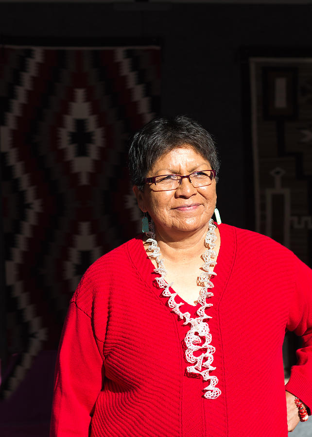 Navajo-Dine Weaver at the 2016 Santa Fe Indian Market Photograph by JannHuizenga