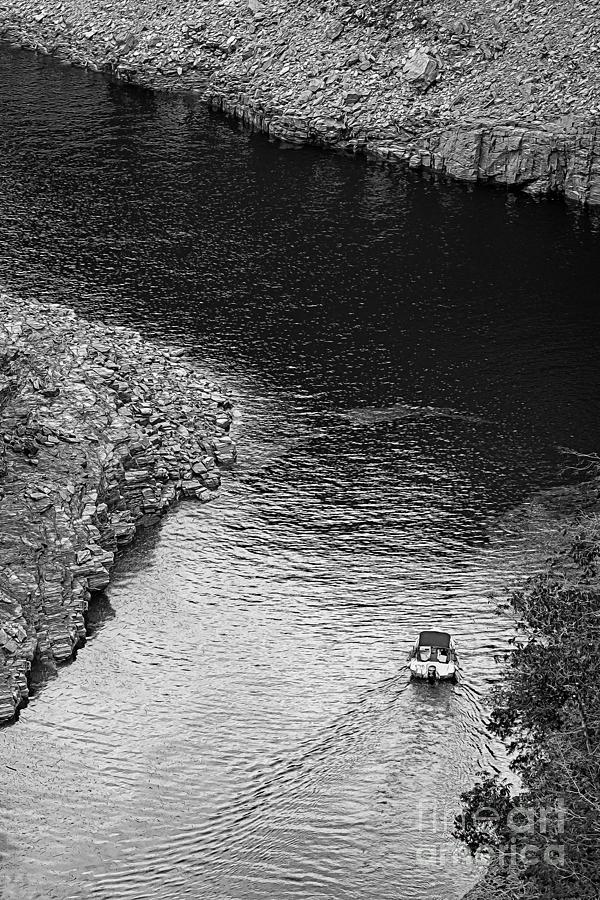 Bend Digital Art - Navigating upstream on a river surrounded by rocks. Black and white. by Vinicius Bacarin