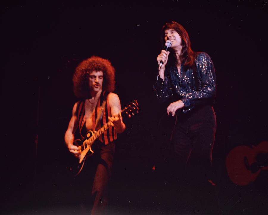 Concert Photograph - Neal Schon and Steve Perry of Journey. December, 1983 by Dan Cuny