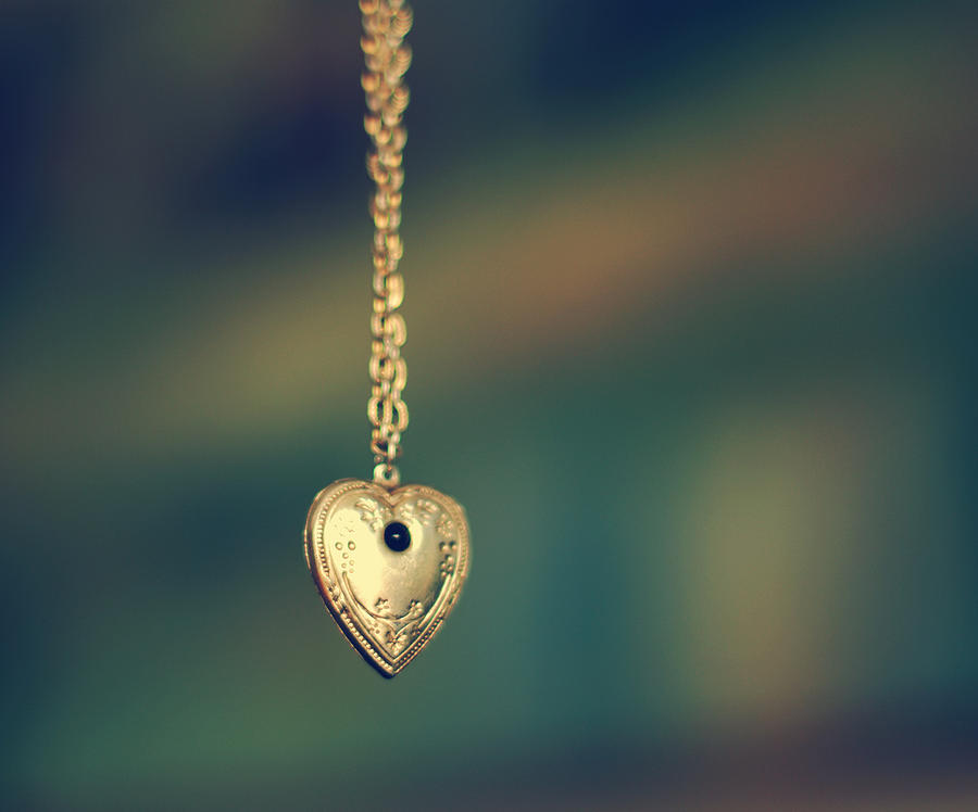 Necklace with heart pendant Photograph by Kristina Strasunske