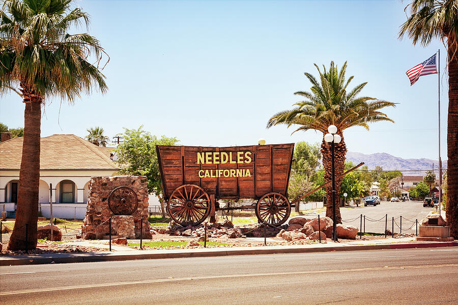 Needles, Welcome Wagon sign, California Photograph by Tatiana Travelways
