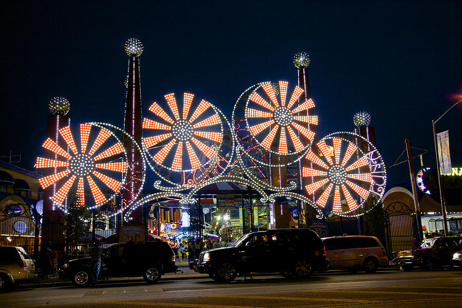Neon lights of Coney Island amusement park Photograph by Barry Winiker