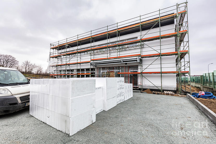 Architecture Photograph - New building construction site. Styrofoam storage by Michal Bednarek