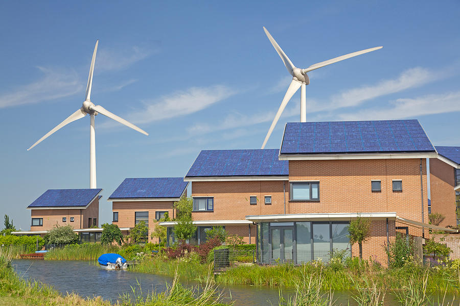 New family homes with solar panels and windturbines Photograph by Ebobeldijk
