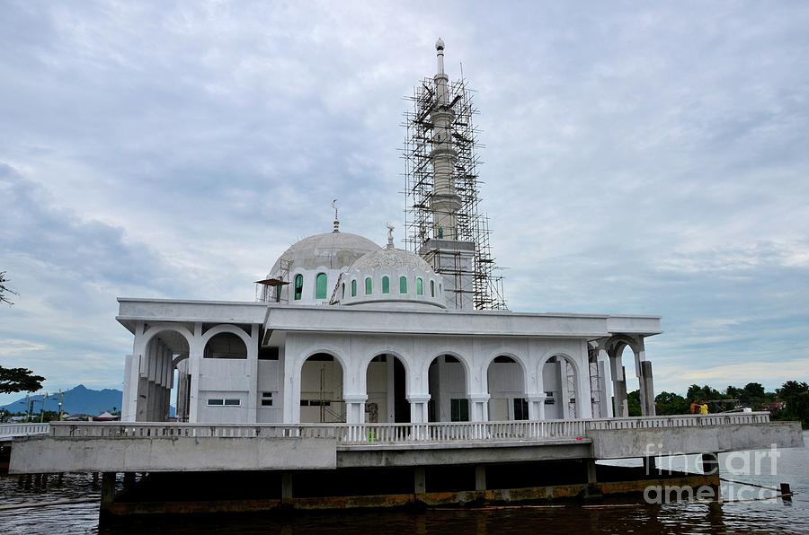New under construction Islamic floating mosque two domes Sarawak river waterfront Kuching Malaysia Photograph by Imran Ahmed