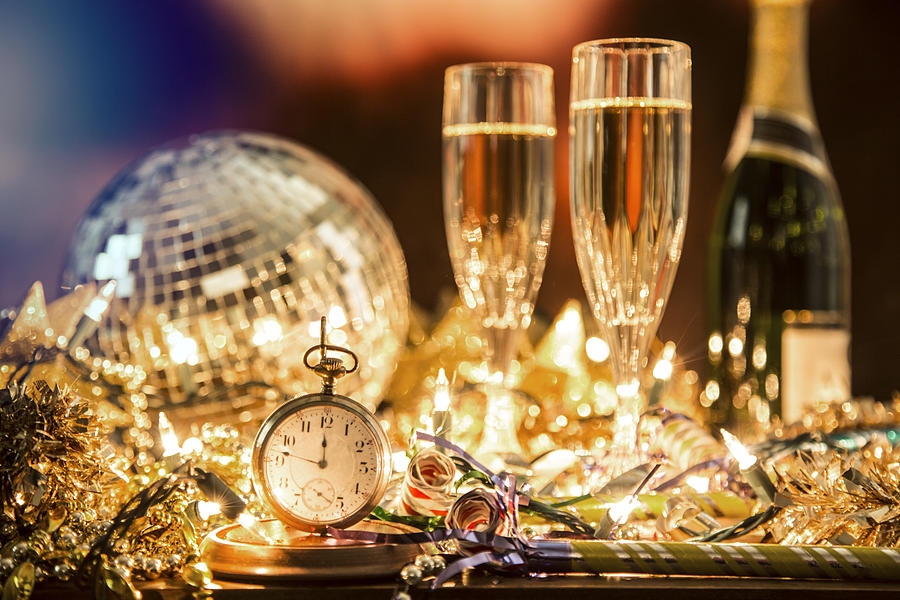 New Years Eve holiday party, pocket watch, clock at midnight. Photograph by Fstop123