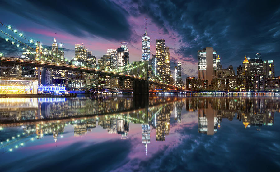 New york skyline from Brooklyn bridge in blue hour with reflection on ...