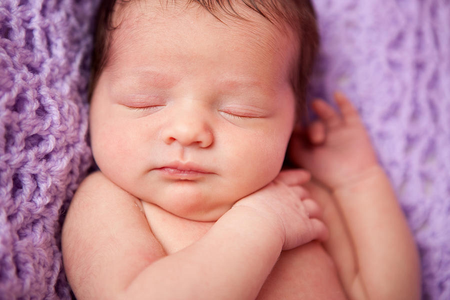 Newborn Baby Girl Sleeping Peacefully on Purple Blanket Photograph by Ideabug