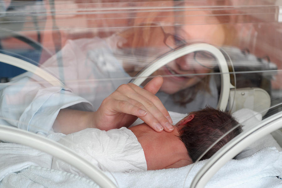 Newborn Premature in Incubator Photograph by Metinkiyak