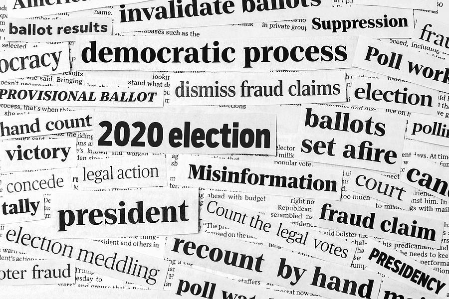 Newspaper headlines of 2020 United States of America presidential election. Concept of misinformation, voter and ballot fraud claims and the democratic process Photograph by JJ Gouin